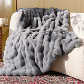 blunique Ultra Soft Cozy Faux Fur Throw with bubble texture for cozy warmth.