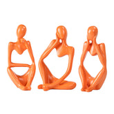 BMLCGJ Thinker statue in gold decor placed on a shelf for warmth and elegance