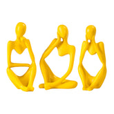 BMLCGJ Thinker statue in gold decor elevates shelf display with elegant charm.