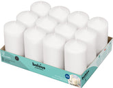 Bolsius 12 white pillar candles packaged for elegant table centerpieces.