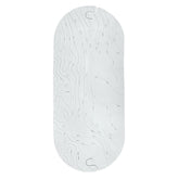 Boon Grifle textured non-slip bath mat on smooth tub for baby safety.