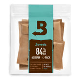 Boveda 84% RH seasoning pack inside a cedar wood box for even humidity