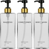 Brighter Barns Clear Shampoo Dispenser Set on a minimalist bathroom shelf for chic, organized storage.