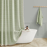 BTTN boho farmhouse curtain with tassel trim adds chic texture to your bathroom