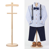 Bucherry wooden color stand showcases baby garments in a tidy arrangement.