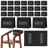 Buryeah reserved signs on a church pew, high-contrast black and white visibility