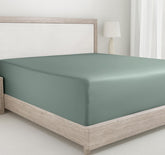California Design Den deep fitted queen sheet in sage green offers secure, snug bed fit.