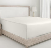 California Design Den queen fitted sheet with deep-pocket design in ivory for secure mattress fit.