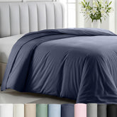 California Design Den indigo dusty blue duvet cover fabric close-up showing soft sateen weave