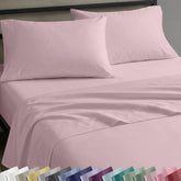 California Design Den pink full-size sheet set on bed with silky sateen finish for comfort