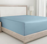 California Design Den queen fitted sheet in sky blue fabric with deep-pocket fit.