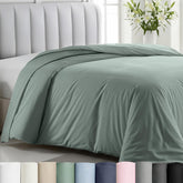 California Design Den sage green duvet cover close-up stitching showcases durable craftsmanship.