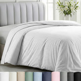 California Design Den striped white duvet cover king closeup, showing silky cotton sateen texture.