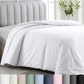 California Design Den twin XL duvet cover white satin close-up showing silky texture.
