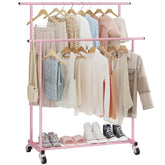 Calmootey double-rod clothing rack in pink provides ample space for organized outfits.