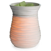 Candle Warmers Illumination Warmer front view shows flame-free safety and ambient glow