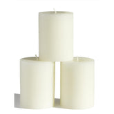CANDWAX 3x4-inch ivory pillar candles set for elegant tabletop decor and long-lasting ambiance.