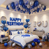Carnira blue-silver balloons create a stylish romantic room setup.