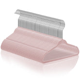 Casafield 50 velvet baby hangers, 11-inch light pink, ideal for compact closet organization.