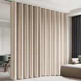 Cbsroro beige room divider panel in a living room, adding privacy and style