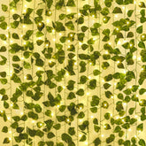 CEWOR ivy vines with lights hung on a wall for a warm room backdrop
