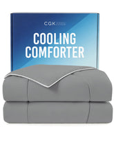 CGK Unlimited cooling comforter on bed, full/queen, dark grey for hot sleepers.