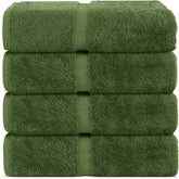 Chakir Turkish Linens Moss bath towel draped elegantly, ultra-absorbent and plush for spa-like at-home use.