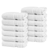 Chakir Turkish Linens washcloth set 12 white folded, soft and absorbent.