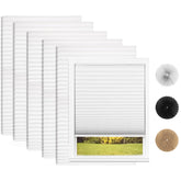 Changshade white pleated shade on a window provides soft light and privacy.