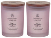 Chesapeake Bay Candle Joy + Laughter cranberry dahlia jar glows softly for a cozy evening