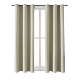 ChrisDowa grommet curtains beige 2-panel setup offers privacy and light control.