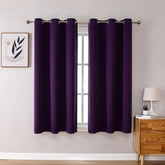 ChrisDowa grommet curtains in royal purple panel blocking light for restful mornings.