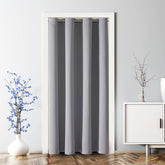 ChrisDowa light-gray door curtain with grommets for smooth sliding and privacy.