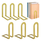 Chunful gold book ends on a shelf keep books upright and accessible.