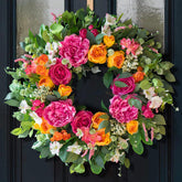 CHvista 24-Inch Spring Wreath with pink roses boosts front door curb appeal.
