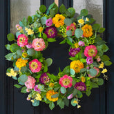 CHvista Spring Wreath on front door featuring peony, rose and ranunculus for a welcoming entry