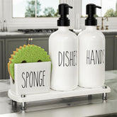 Cisily glass soap bottle with gold pump for a sleek kitchen display