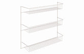 ClosetMaid 3-tier wall rack on pantry wall for spice storage and easy access