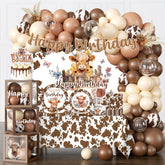 Cocomigo Highland Cow birthday banner adds a festive focal point for photos.
