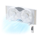 Comfort Zone window fan in action cooling a bright bedroom breeze.