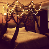 Comtelek 8-corner bed canopy over a queen bed with four-door design.