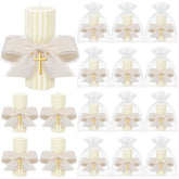 Conelist baptism candles with bows and crosses for elegant First Communion decor.