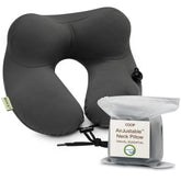 Coop Home Goods AirJustable neck pillow inflated for personalized head and neck support on flights.