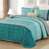 Cottolester Teal Quilt Set on a queen bed with bold plaid in blue teal and grey.