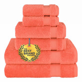 Cotton Paradise coral six-piece towel set with bath towels shown, offering plush absorbency for daily use.