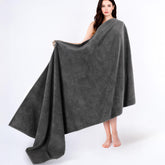 Cotton Paradise dark gray Turkish towel laid flat for luxurious bath comfort