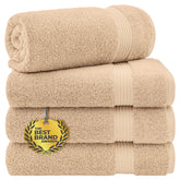Cotton Paradise Turkish towel set with four extra-large beige towels for family bathroom refresh.