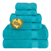 Cotton Paradise Turkish towel set in Ocean Aqua on display for family bathroom use.