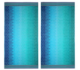 Cotton Craft oversized XL beach towel in blue tile print for spacious beach lounging.