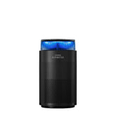 Coway air purifier in a bedroom showing expansive 810 sq ft coverage.